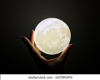 Hand Holding A Moon