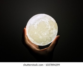 Hand Holding A Moon