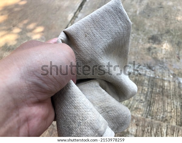 hand\
holding a motorcycle car dryer cloth and\
others