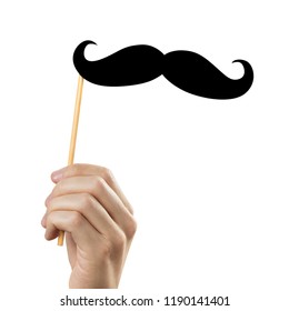 Hand Holding Moustache On A Stick, Isolated On White Background