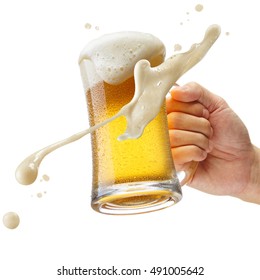 hand holding a mug of beer toasting - Shutterstock ID 491005642