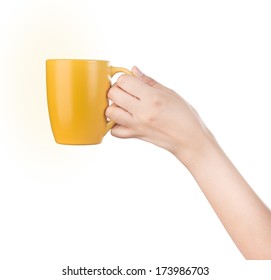 Hand Holding Mug Isolated On White.