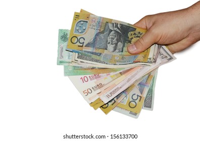 Hand Holding Multi Currency Money Bills