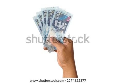 hand holding new bills peruvian money on white background