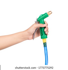 Hand Holding Nozzle On A Hose For Watering. Hose Nozzle Spraying Water Isolated On White Background.