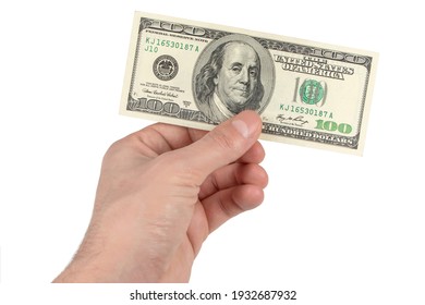 Hand Holding A One Dollar Bill. Isolated On White.