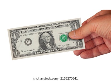 Hand Holding One Dollar Bill. Image Isolated On White Background.