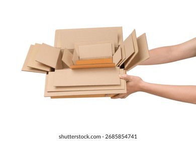 Hand holding an open empty stack of cardboard boxes, isolated on a white background. This concept is suitable for transportation, business, delivery, e-commerce, logistics, and online shopping.
