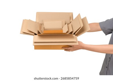 Hand holding an open empty stack of cardboard boxes, isolated on a white background. This concept is suitable for transportation, business, delivery, e-commerce, logistics, and online shopping. - Powered by Shutterstock - Get 15% off with code: PIKWIZARD15