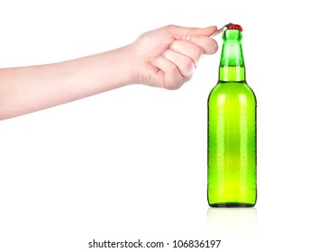 Hand Holding And Opening Beer Bottle With Metal Opener