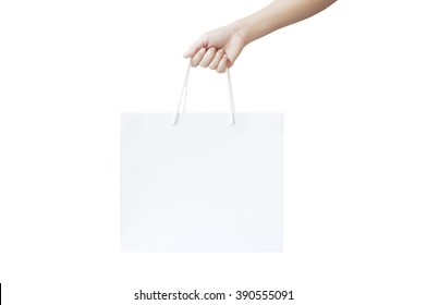 Hand Holding Paper Bag On White Background