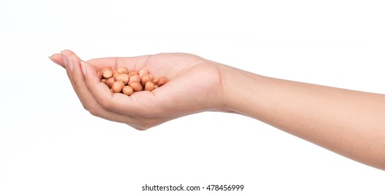 Hand Holding Peanuts Isolated On White Background