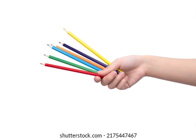 Hand holding pencil against white background