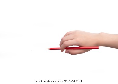 Hand holding pencil against white background
