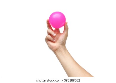 Hand Holding A Pink Plastic Ball