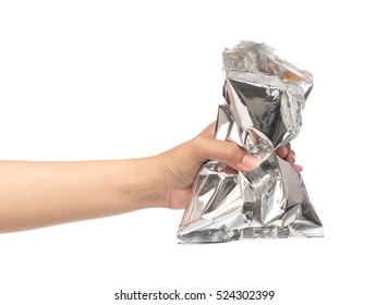 hand holding plastic bag snack packaging isolated on white background