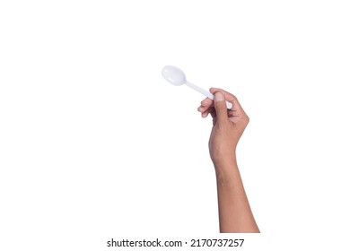 Hand Holding Plastic Spoon Isolated On White Background