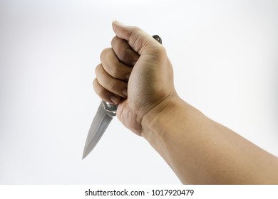 Hand Holding A  Pocket Knife  Isolated On A White Background.