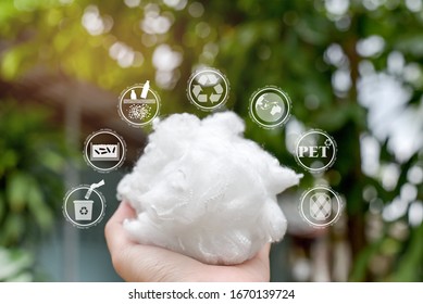 Hand Holding Polyester Stable Fiber With Green Background,recycle Icon,picking Up And Wash Plastic Bottle,Protect The Earth Icon,PET Icon And Yarn Icon.Chemical Concept