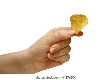 Hand Holding A Potato Chip. Isolated On White.