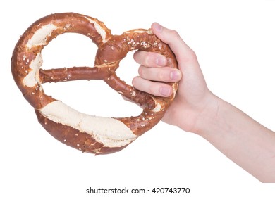 Hand Holding Pretzel Over White Background