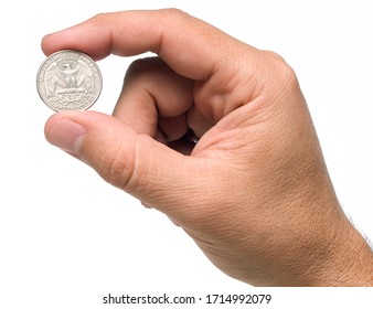 A Hand Holding A Quarter Dollar Coin With Two Fingers, Isolated Over A White Background.