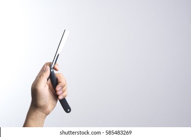 Hand Holding Razor Use In Barber On White Background