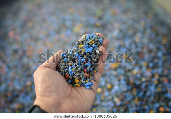 Hand Holding Recycled Plastic Chips Raw Stock Photo Edit Now