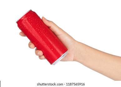 hand holding red aluminum cans with fresh water drops isolated from white background.