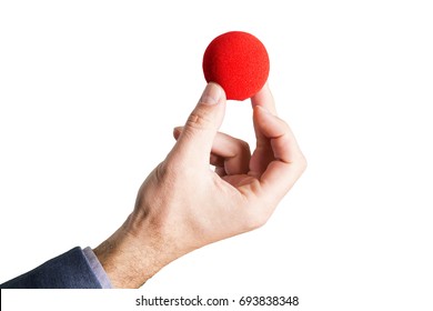 Hand Holding A Red Ball