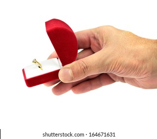 Hand Holding A Red Gift Box With  Wedding Ring