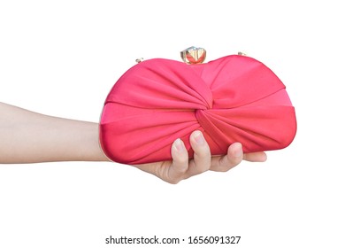 Hand Holding Red Luxury Clutch Bag Isolated On White Background. 