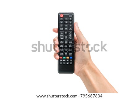 Hand holding remote control isolated on white background