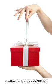 Hand Holding Ribbon And Open Gift Box