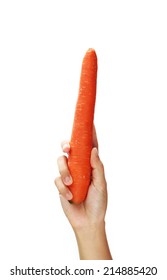 Hand Holding Ripe Carrots. Isolated On A White Background