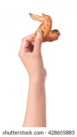 Hand Holding Roasted Chicken Wing Isolated On White Background