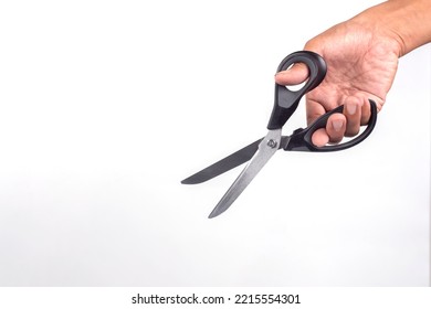 Hand Holding Scissors Isolated On White Background