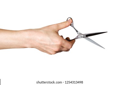 Hand Holding A Scissors On An Isolated White Background