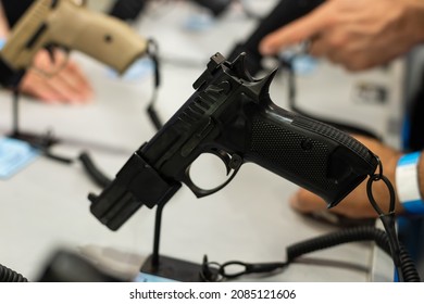 Hand Holding A Semi Automatic Handgun