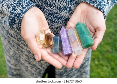 Hand Holding Set Of Chakra Stones. Magic Healing Rock For Reiki Crystal Ritual, Witchcraft, Spiritual Esoteric Practice