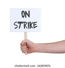 Hand Holding Sign, Isolated On White - On Strike