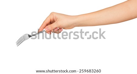 hand holding a silver fork on an isolated white background