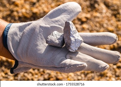 Hand Holding Silver Stones, Silver Ore. Gemstone Mining Concept