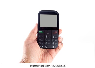 Hand Holding Simple Mobile Phone With Keypad On White Background