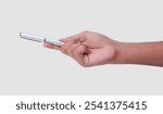 Hand Holding Sleek Silver Pen with A Metal Cap Giving And receiving Pen Concept On White Background