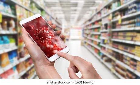 Hand Holding Smart Phone With 3D Coronavirus Or Covid-19 Screen Background In Department Store. Photo Shot Blurry Supermarket. Smartphone Technology Lifestyle. Health And Medical Theme