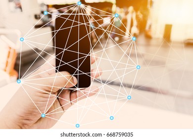 Hand holding smart phone taking photo and shared on social network. Social media with telecommunication technology, on abstract background, Connected lines.