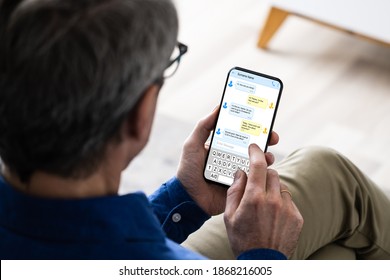 Hand Holding Smart Phone With Text Message - Shutterstock ID 1868216005