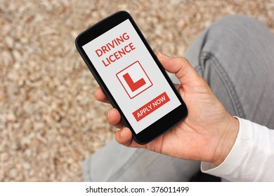 Hand Holding Smartphone With Driving Licence App Mock Up On Screen. All Screen Content Is Designed By Me