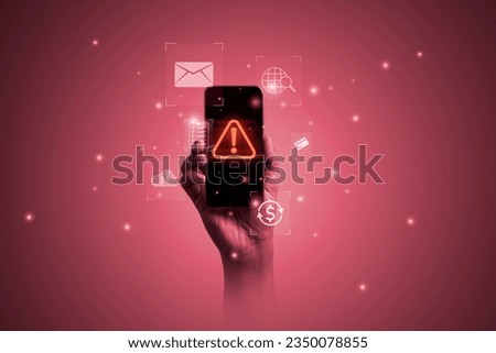 Hand holding smartphone with triangle caution warning sign or exclamation and technology icon such as e-mail , cloud computing for notification error , virus attack , hacker and maintenance concept.